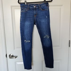 Ripped Knee Rockstar Skinny Jeans